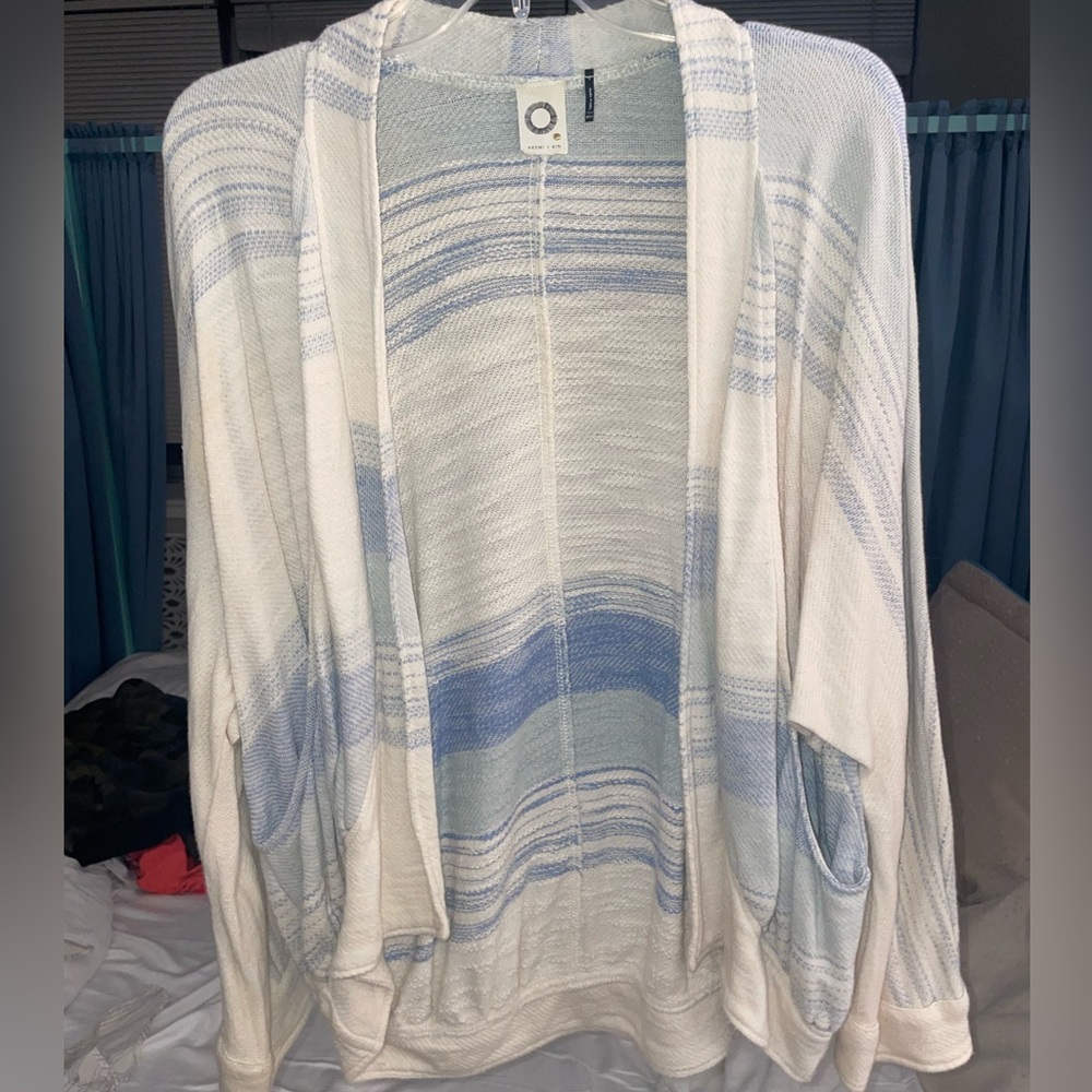Open front cream and blue sweater